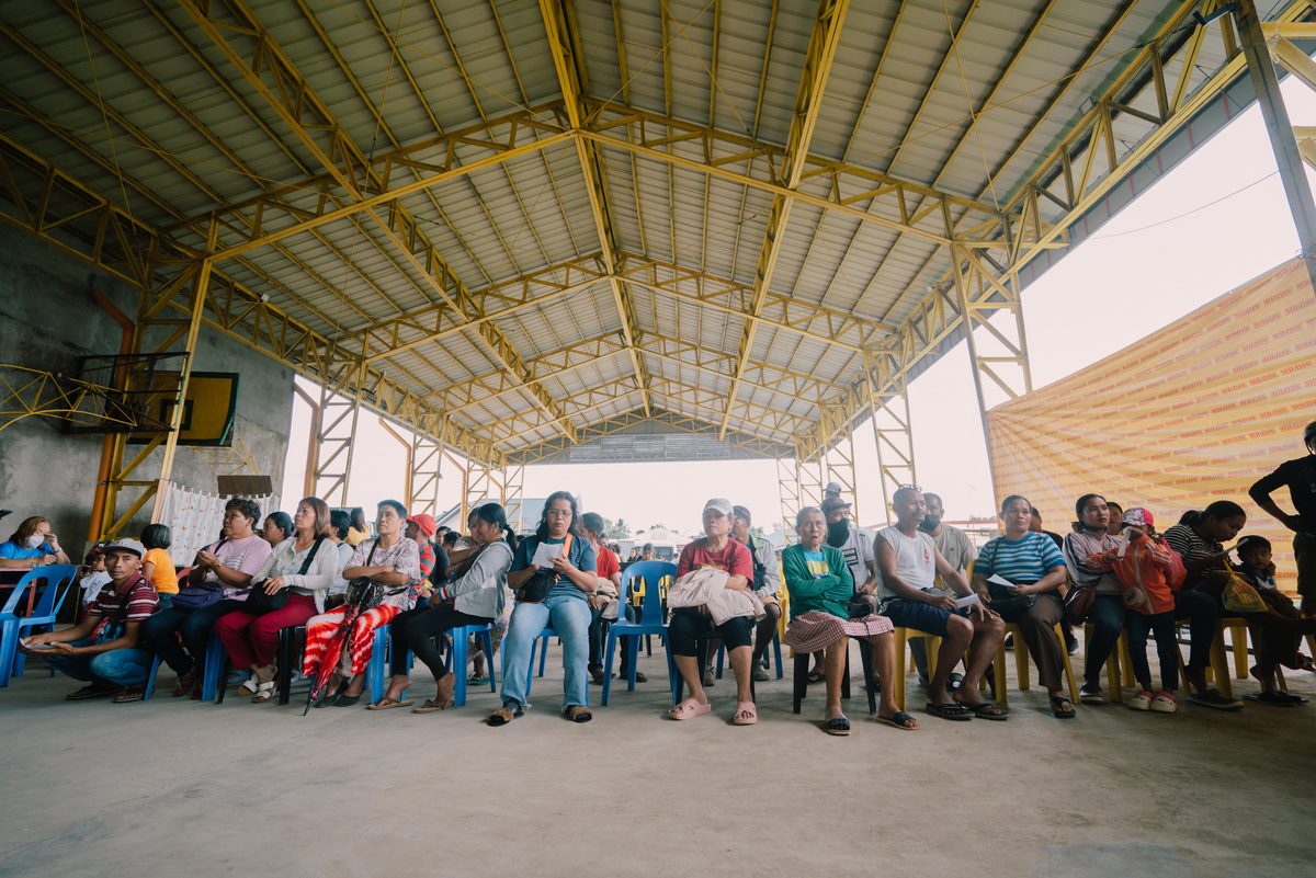 Hundreds of residents waiting to be served at the mission venue