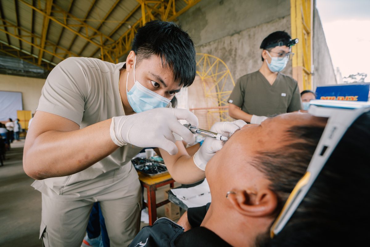 Optical screening being performed for a mission beneficiary